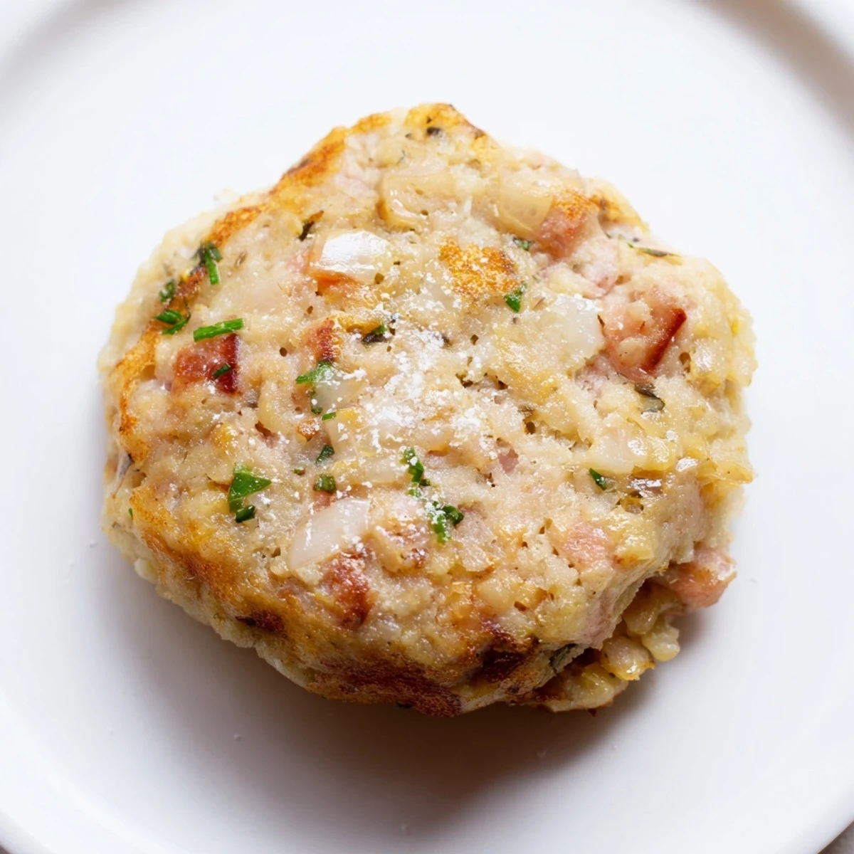 Savory and hearty, these Depression-Era Ham & Potato Patties are fried golden, a comfort food classic.