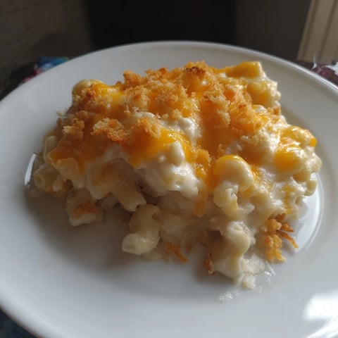 Bubbling baked mac & cheese with evaporated milk, cheesy and golden brown, ready to serve.