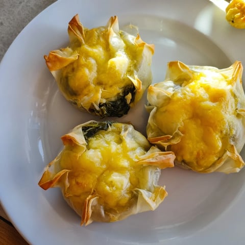 Golden and savory Star Shaped Asparagus Bundle Wraps, perfectly baked and ready to serve as a delicious vegetarian appetizer.