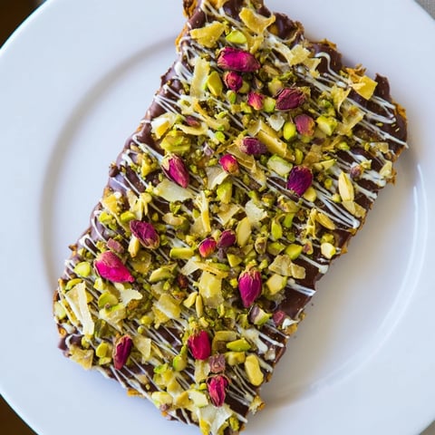 Pistachio Dubai Chocolate Bark: a close-up of the delicious layered chocolate bark with crispy phyllo and pistachios.