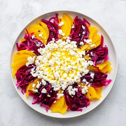 Vibrant Radial Symmetry Sunburst salad, arranged with artistic precision, offering a burst of fresh flavors.